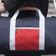 Illustration for article titled The Best Gym Bags For Lugging Your Sweaty Clothes In Style